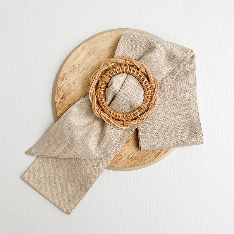 Natural sash with rattan buckle to be used as a cushion accessory, perfect for a classic or traditional style cushion or home.