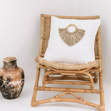 Load image into Gallery viewer, White boho cushion featuring a boho decoration made of seagrass and timber beads. Natural décor.
