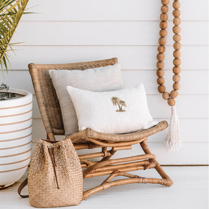 Cream and brass palm tree Cushion is a beautiful decorative cushion that will enhance your resort style home or tropical interior.