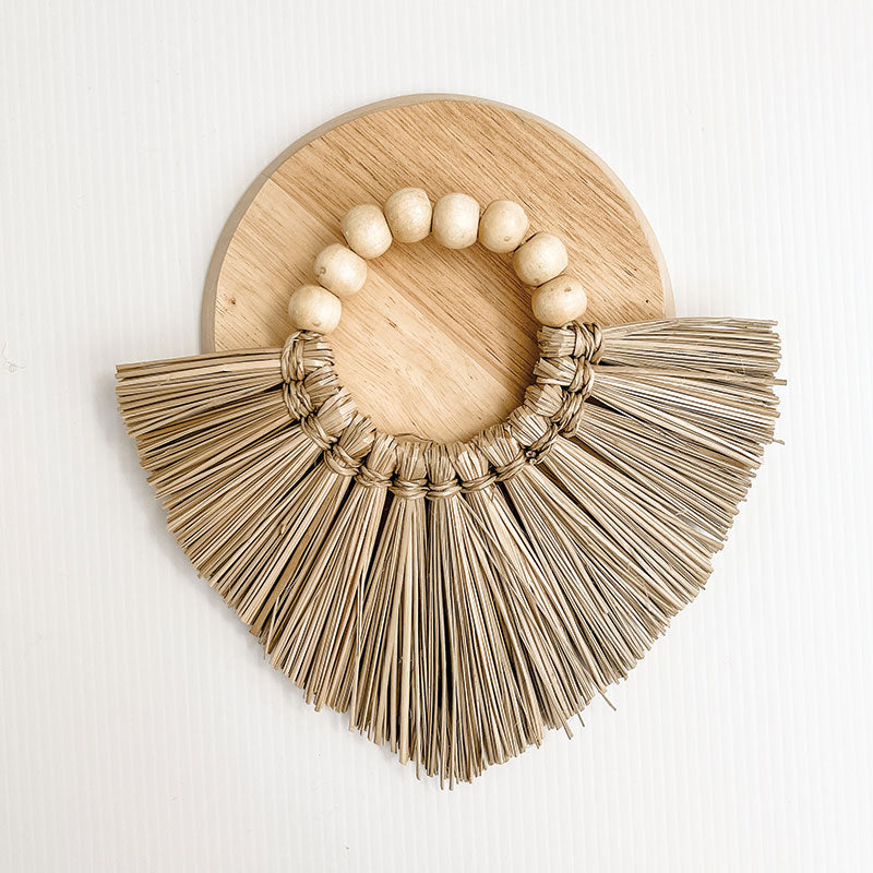 Cream Boho Lumbar Cushions with Seagrass Disk can be used as a feature piece in your boho style bedroom or in your Bohemian living room. Seagrass cushion accessory.