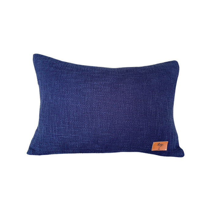 Blue 100% cotton coastal cushion with a small palm tree leather patch. Can be used as a beachy pillow.